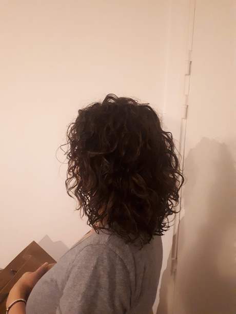 Coupe cheveux long frisés femme